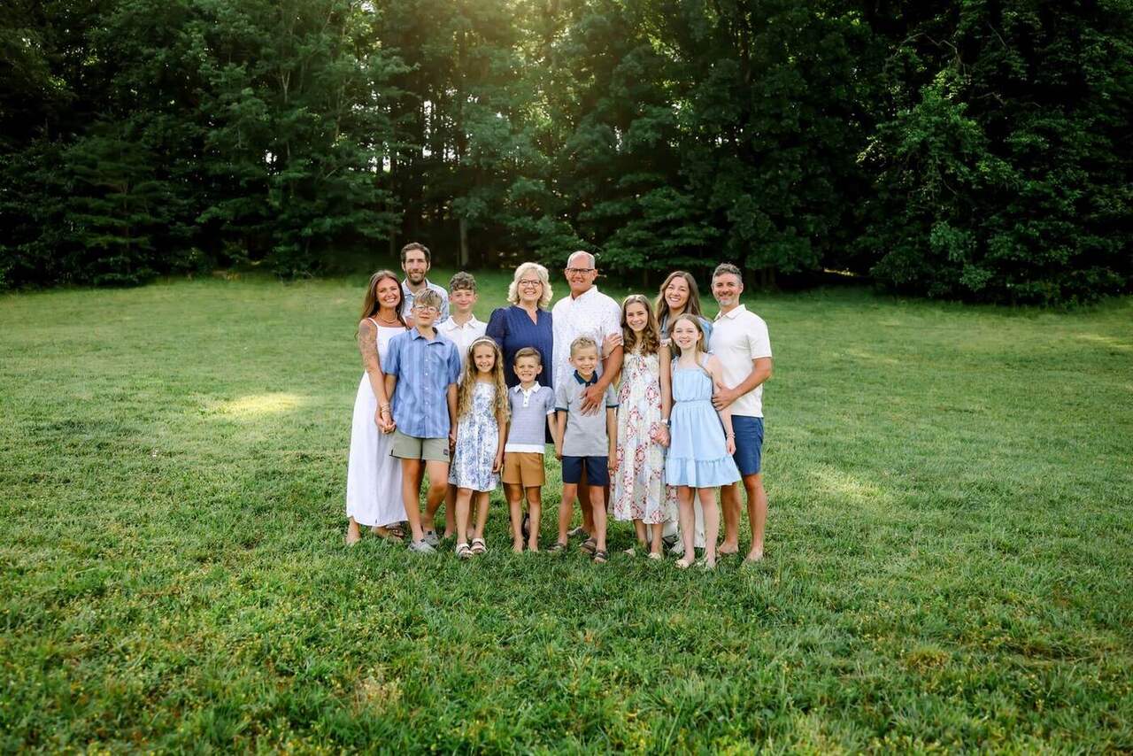 Robin and Phil with their children and grandchildren in the field